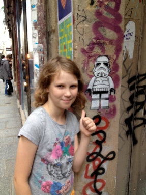 Charlotte with street art in the Marais