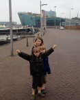 Kids in front of the NEMO Science Center, AKA "the Titanic"