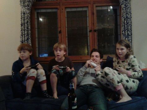 Uncle Dan losing to his nephews at "Mario Smash Brothers" on the Wii